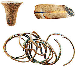 Fig. 15 Fidvár near Vráble 2007: surface finds identifiable as remains of metallurgical activities: tuyère, cushion anvil, bronze hoard (photograph: Falkenstein).