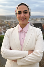 Foto von Frau in weißem Blazer