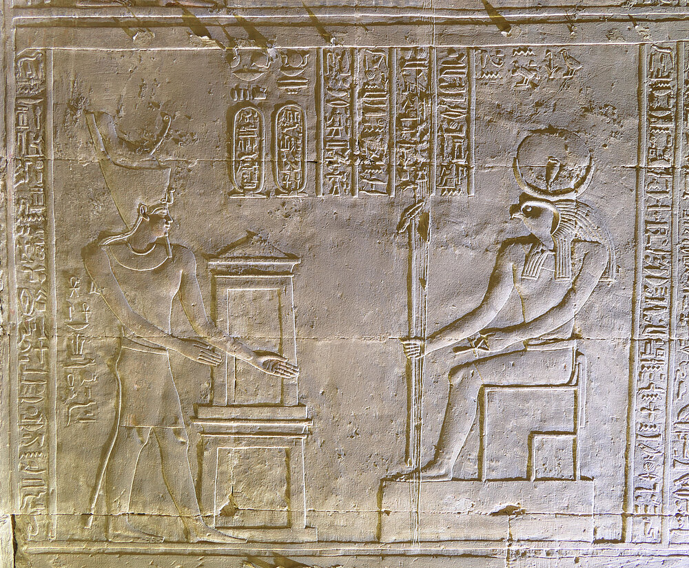 The king consecrates the sanctuary to Chons of Edfu.